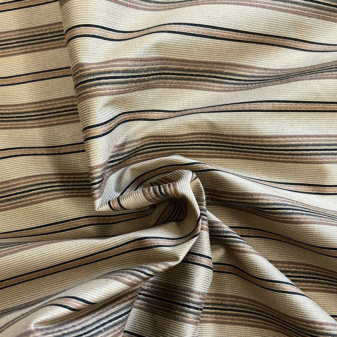 Beige fabric swatch with thin brown and black stripes.
