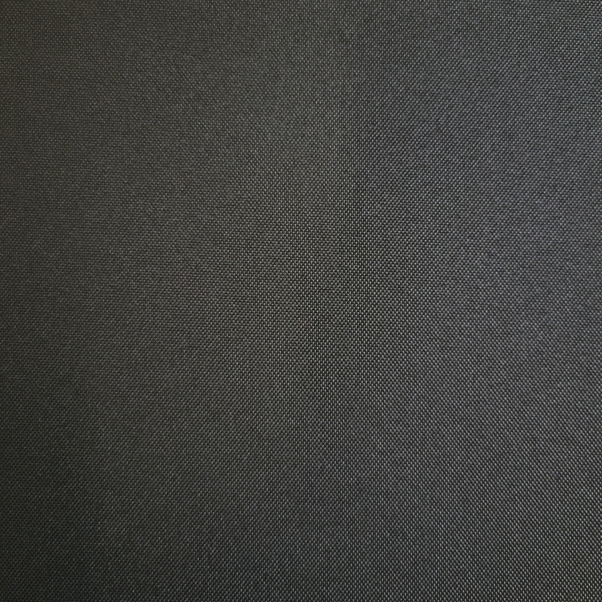 Carter Black Onyx Ford ring #1852: close-up of dark gray textured fabric.