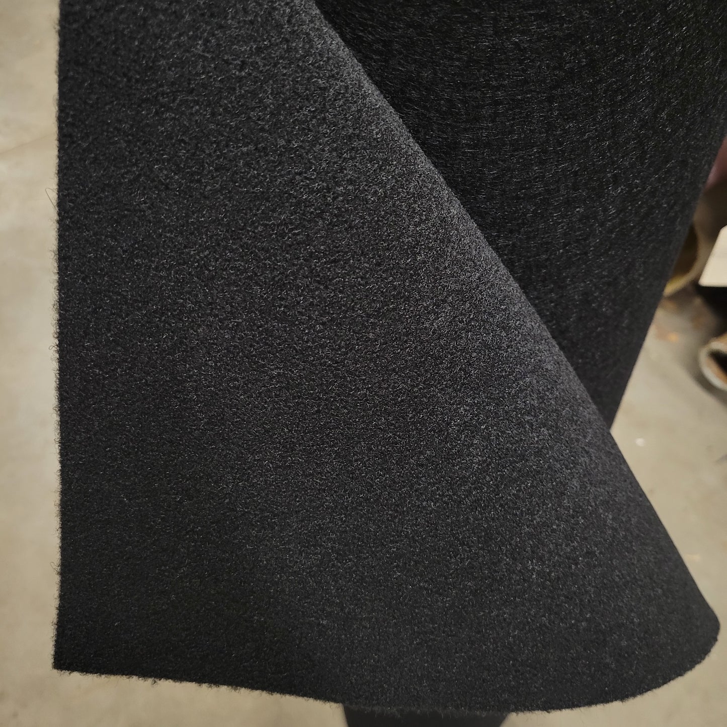 Ez Flex Black Trunk Liner GM 990: Durable, black carpeted trunk liner for superior protection.