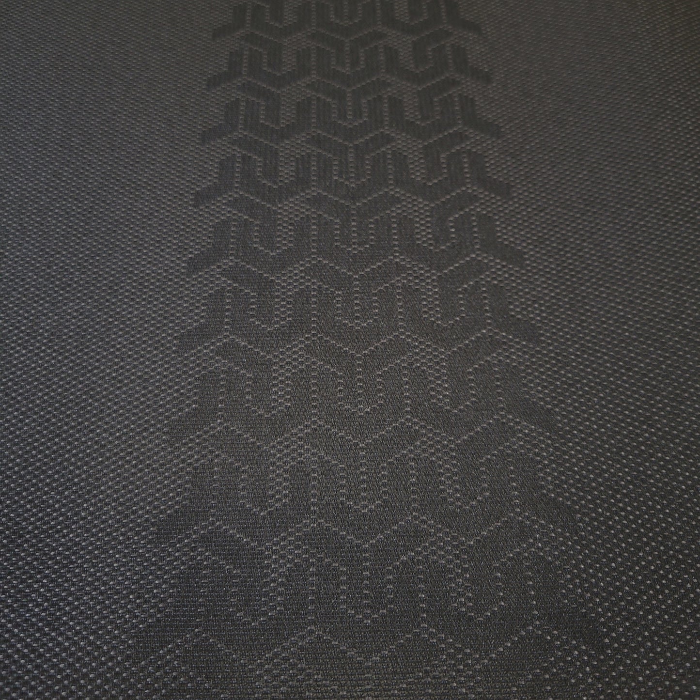Dark gray fabric swatch with subtle textured pattern.