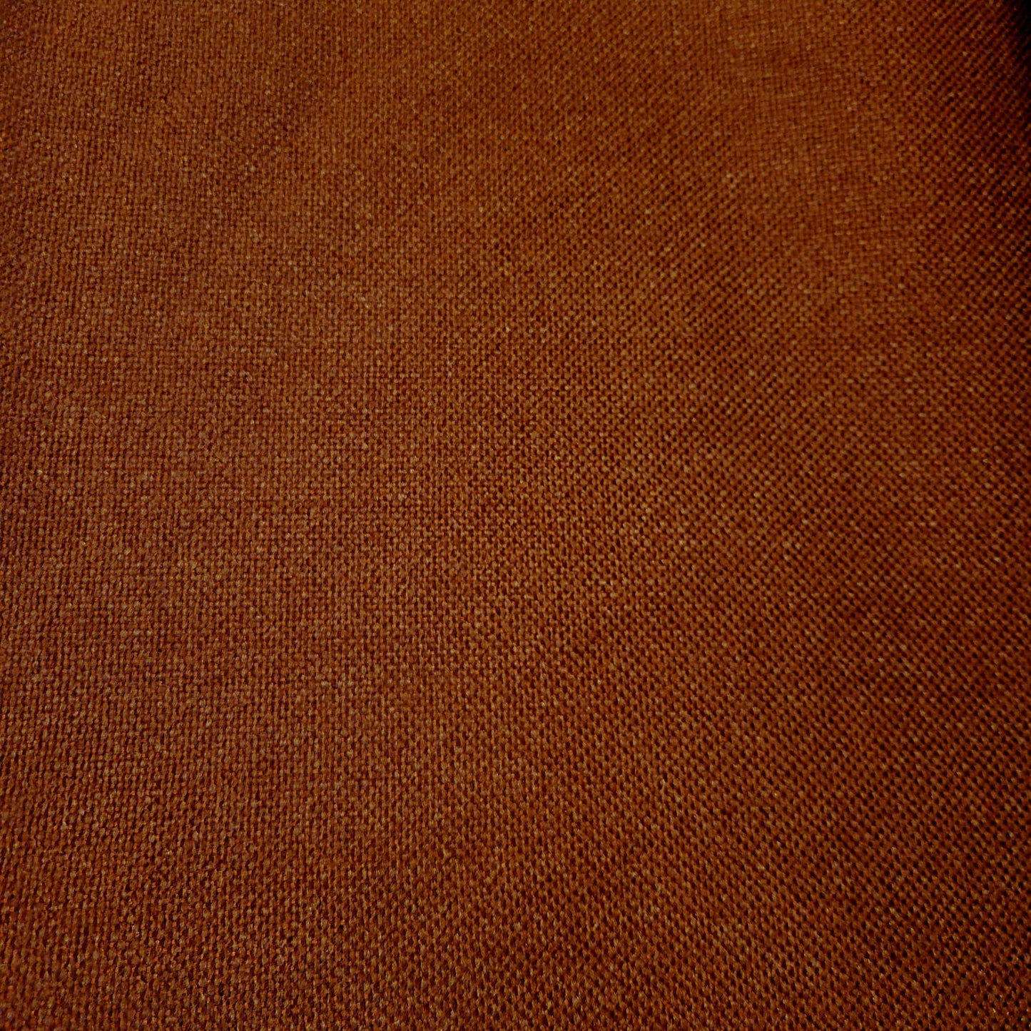 Debbie Shrimp RING #83: Close-up of rich brown fabric texture.