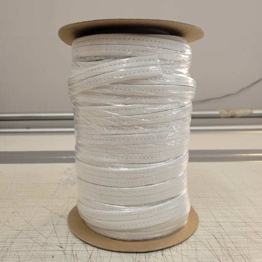 White Hidem Welt 25yd roll of white leather cord, perfect for DIY projects.