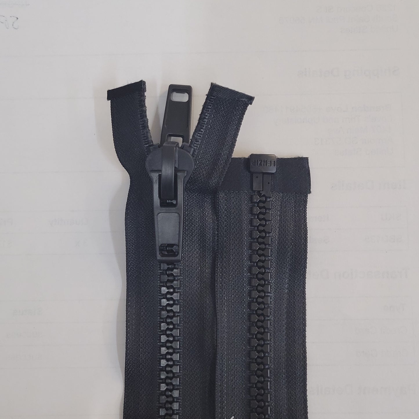 Black #10 plastic double pull zipper for apparel and crafts.