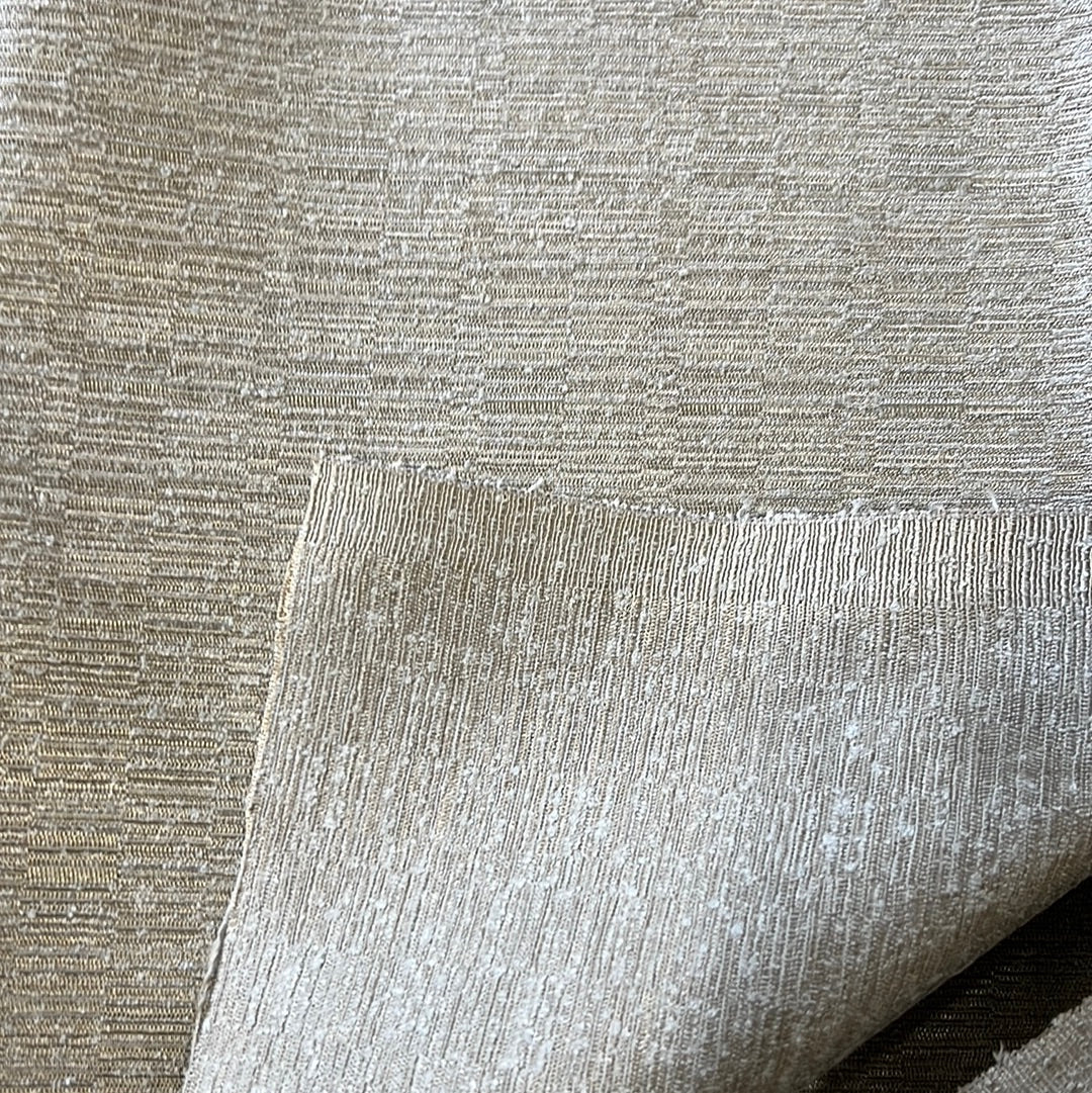 Textured platinum fabric swatch, subtle shimmer, close-up view.