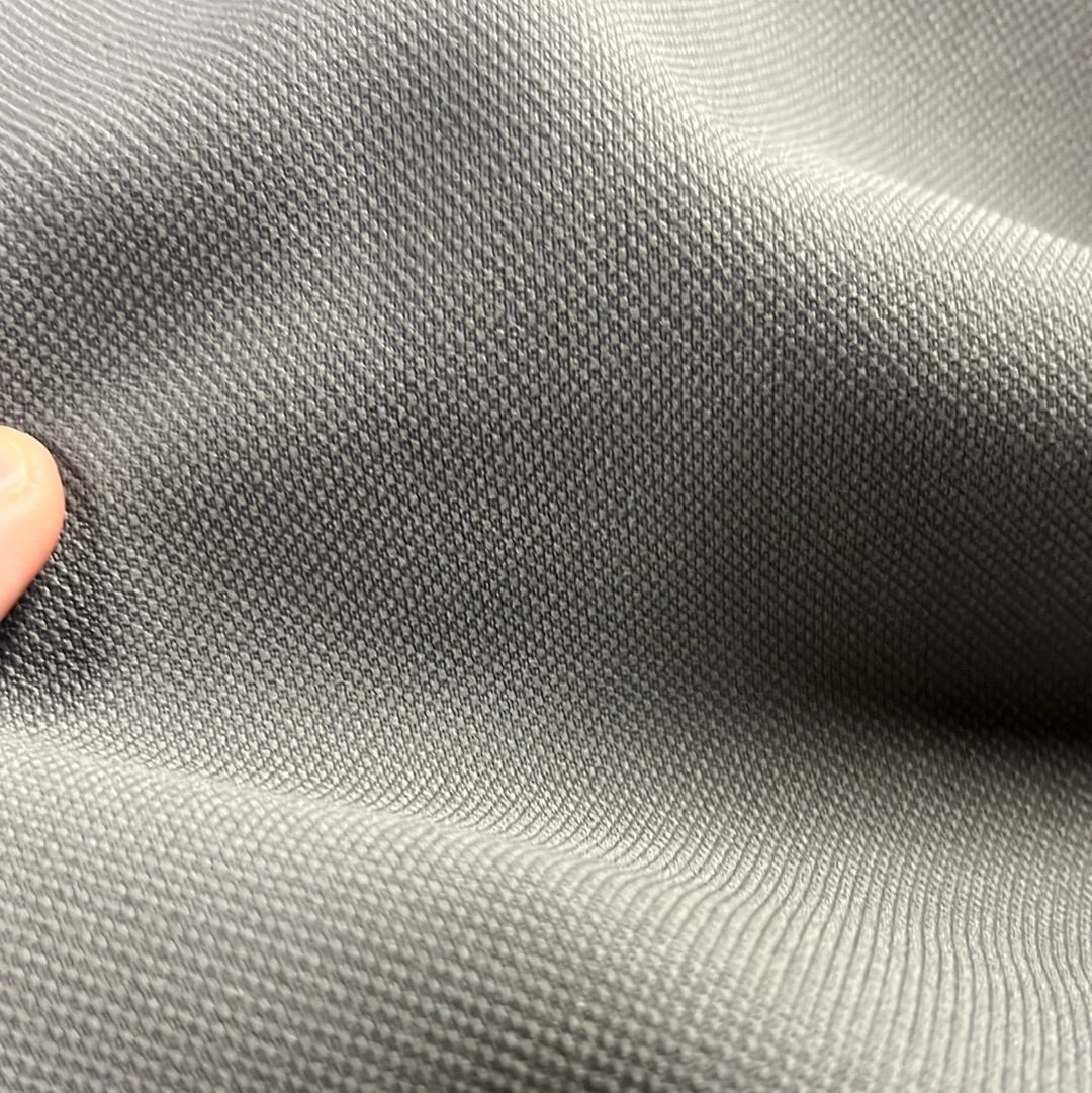 Close-up of dark ash grey fabric, showcasing its textured weave.