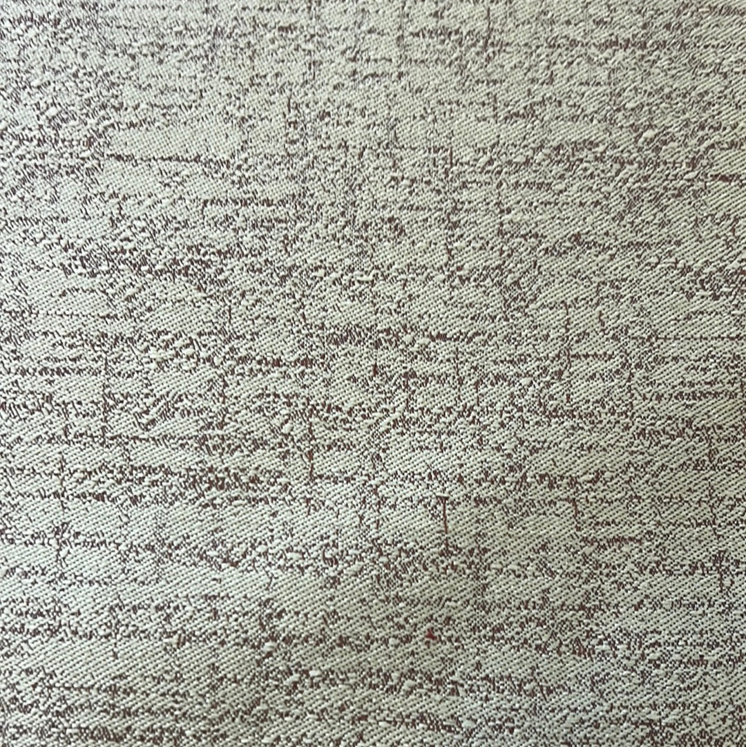 1887 Winnebago Quiet Comfort Green fabric swatch: textured beige upholstery with subtle brown pattern.