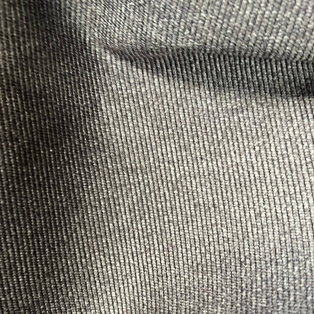 Close-up of steel gray fabric texture showing fine ribbed detail.
