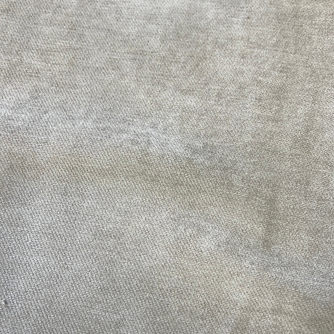 Close-up of 1902 Winston Cream's soft, light beige fabric texture.