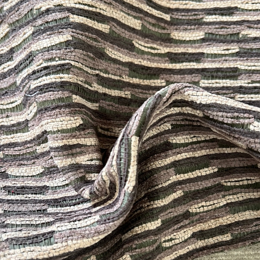 Textured upholstery fabric in taupe, gray, and olive green stripes.