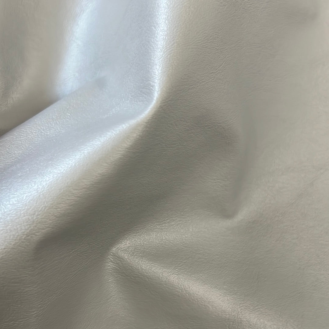 Close-up of light gray marine-grade vinyl with subtle texture.
