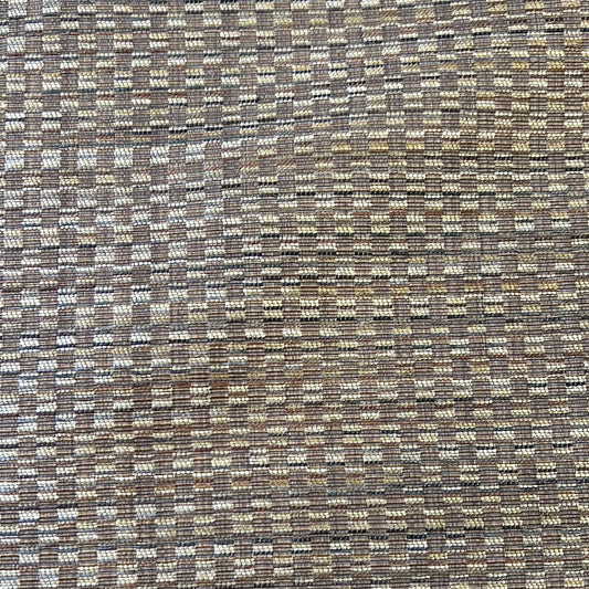 1896 Cone Vacquards fabric swatch: Textured neutral tone upholstery fabric with subtle checkered pattern.