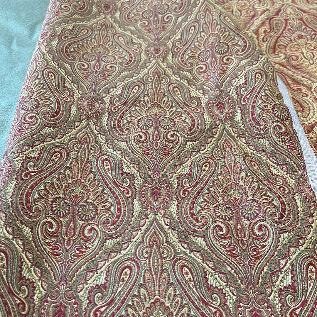 1926 Bennington Gold upholstery fabric: Red, gold, and beige paisley damask pattern.