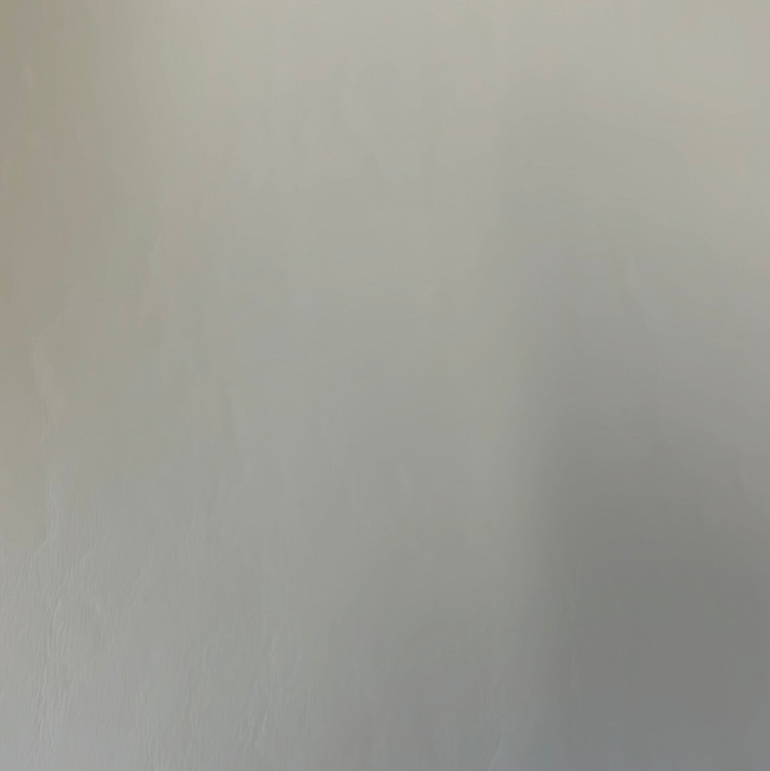 Light gray textured surface