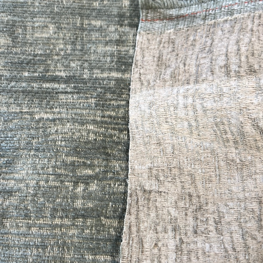 Sage and gray upholstery fabric swatches, showing texture detail.