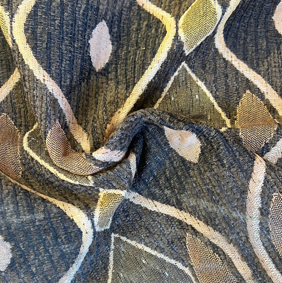 Brown upholstery fabric with textured geometric pattern in beige and olive green.