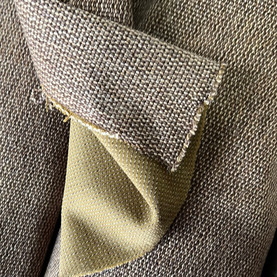 Brown and gold textured fabric swatches, showcasing a close-up of the weave.