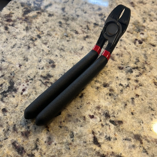 Black Bent Hog Ring Pliers with red accents for hog ring installation.