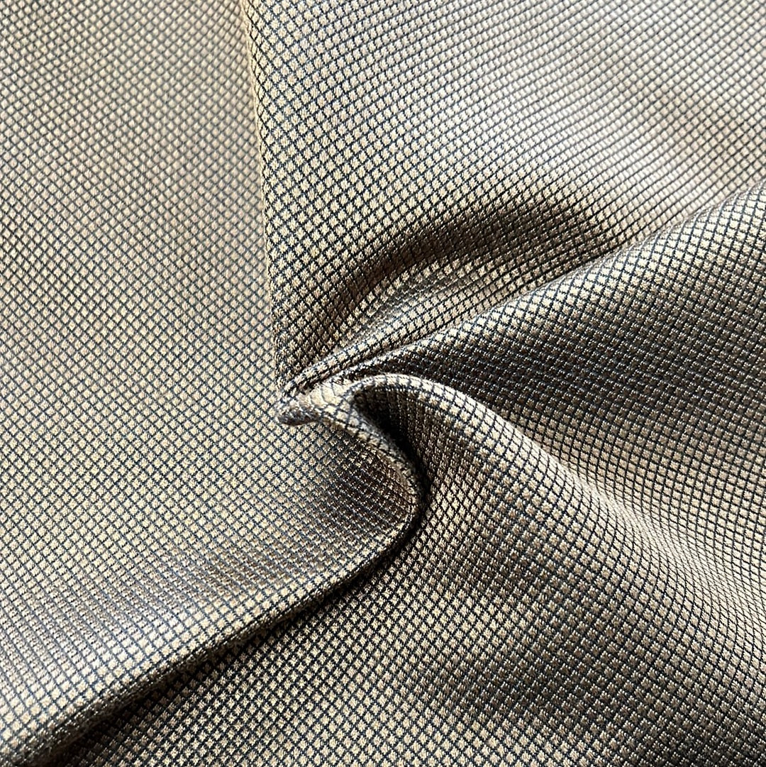 Funtutti Choco fabric: Gold and black geometric pattern, luxurious textured upholstery material.