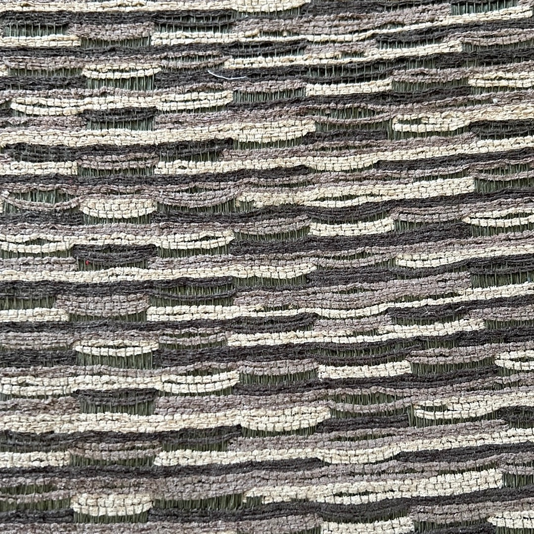 1920 Abracadabra Graphis fabric swatch: gray and beige textured upholstery material.