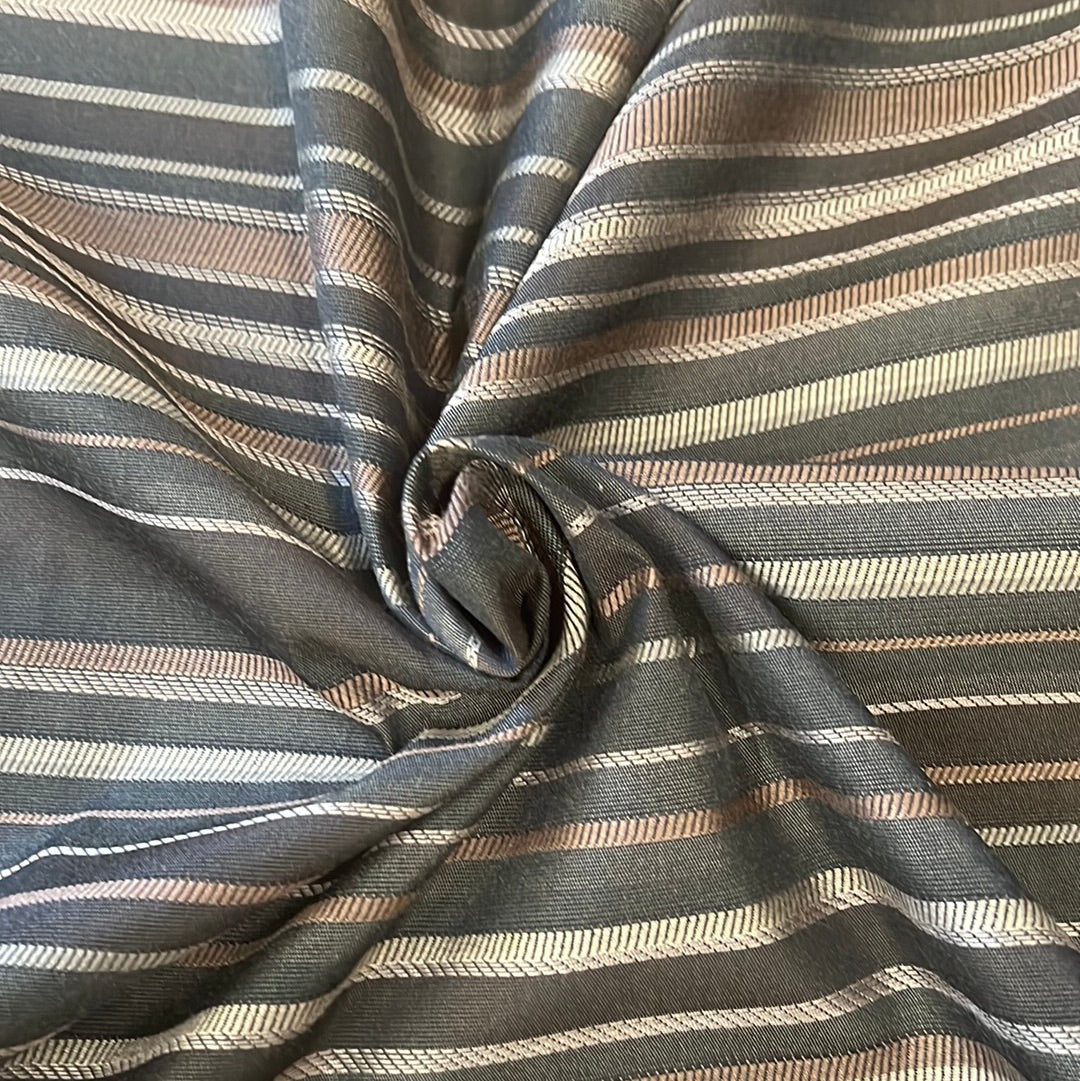 Dark gray fabric swatch with subtle taupe and white stripes, showcasing texture and drape.