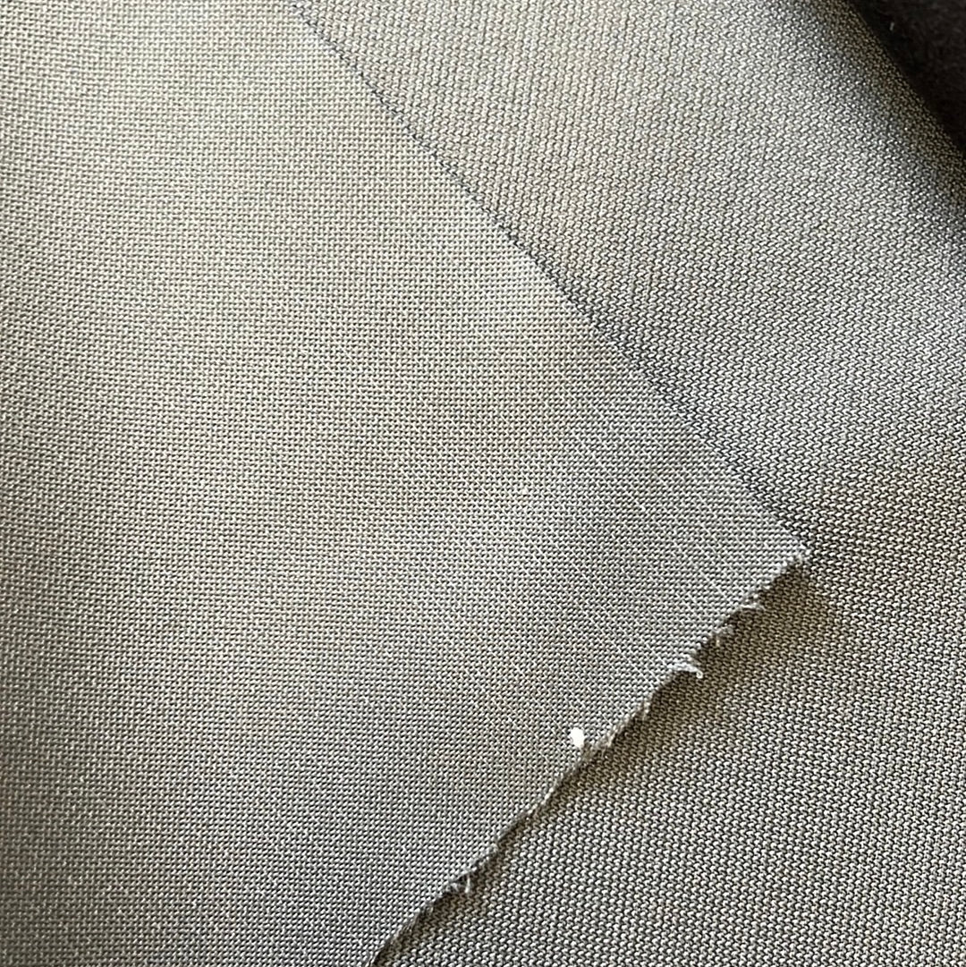 Close-up of dark slate gray fabric swatch, showcasing texture and subtle weave.