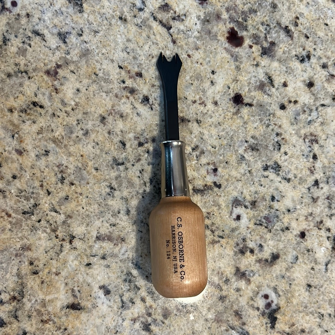 C.S. Osborne & Co. No. 124 Staple Lifter with wood handle and black metal claw.