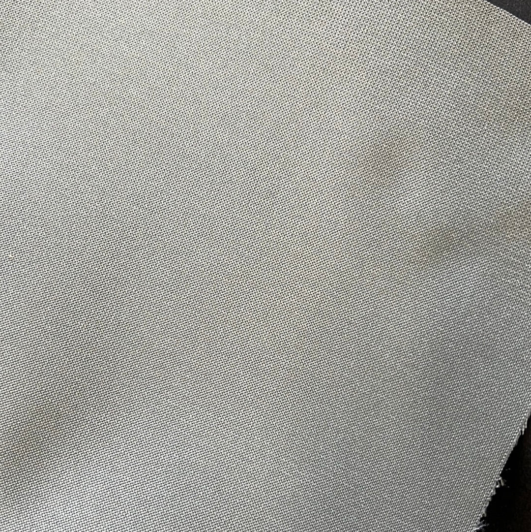 1872 Hydro Med Dk Slate fabric swatch: close-up of finely woven, light gray textile.