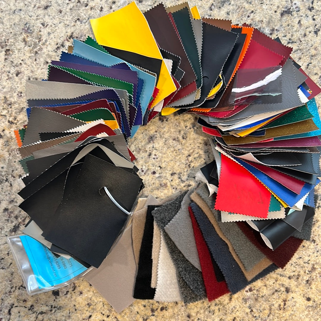 Vinyl upholstery sample ring: diverse color vinyl & fabric swatches for furniture projects.