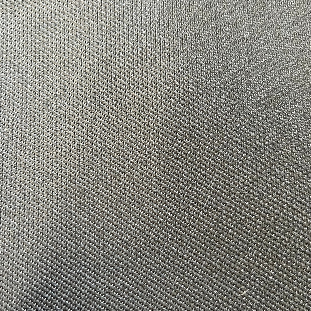 Close-up of dark gray speaker grille fabric texture.