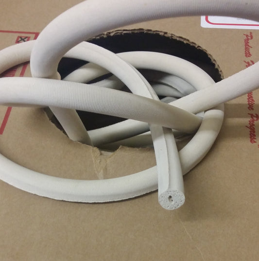 Off-white 1/2" sponge rod rubber cord in cardboard box.