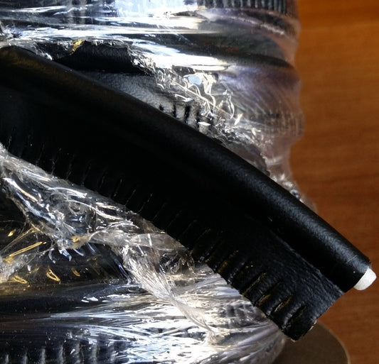 Black embossed cushion vinyl welt, 25yd roll