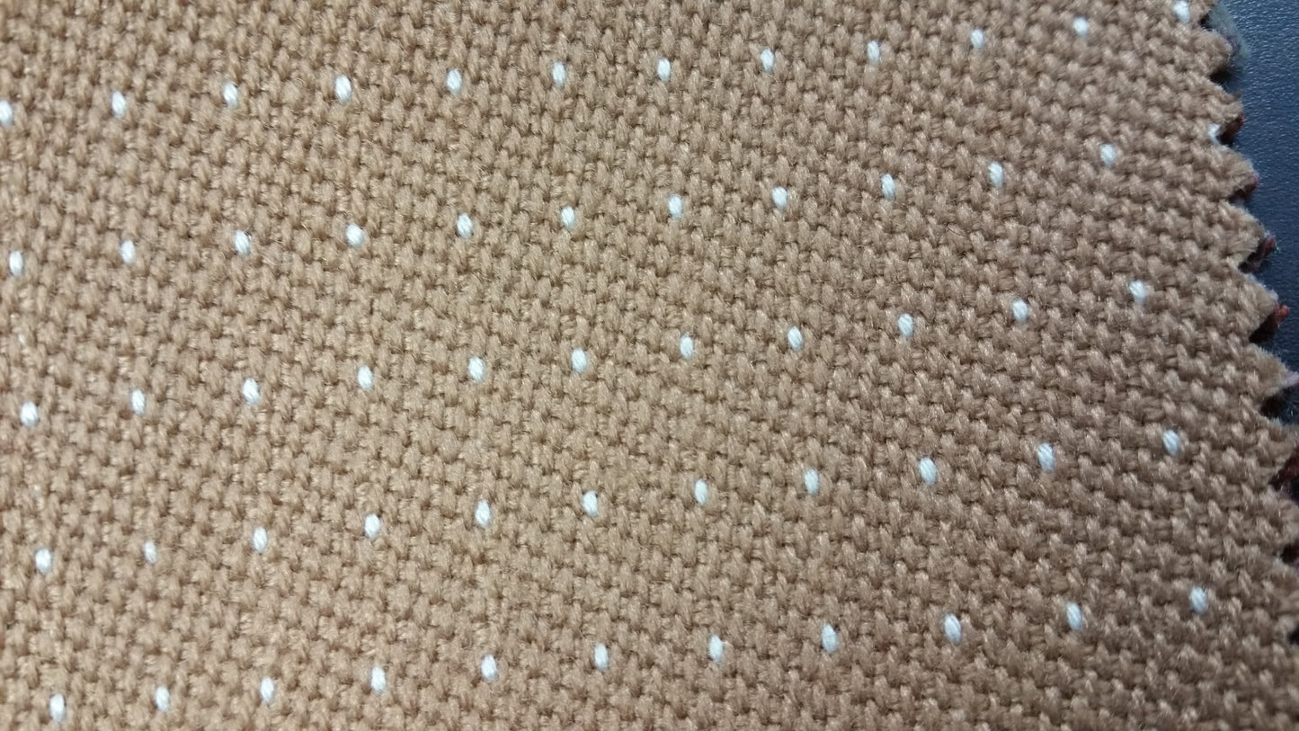 Tan contract fabric swatch, NTM0016, featuring a subtle white dotted pattern.