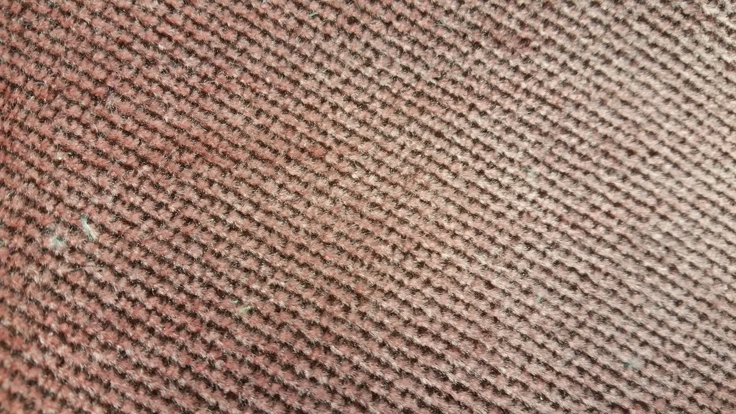Ring 1014 Conversion Van Fabric: Close-up of textured maroon fabric with diagonal pattern.