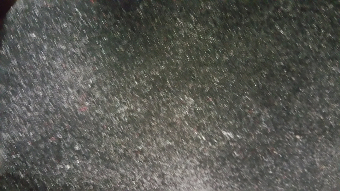 Close-up of Ring 1291 Black Euro textured surface.