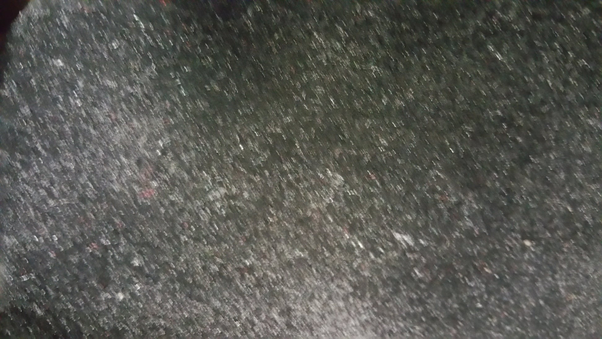 Close-up of Ring 1291 Black Euro textured surface.