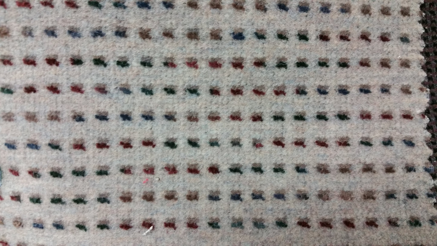 Ring 1334 Challenger Dune carpet sample: Beige wool with multicolored flecks.