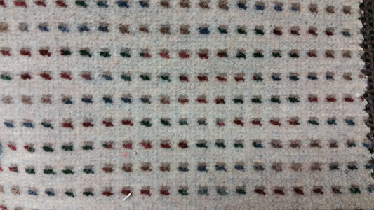 Ring 1334 Challenger Dune carpet sample: Beige wool with multicolored flecks.