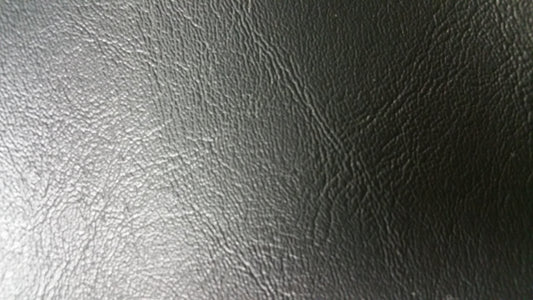 Ring 3090 Wallaby Black Upholstery Vinyl: textured black vinyl fabric sample.