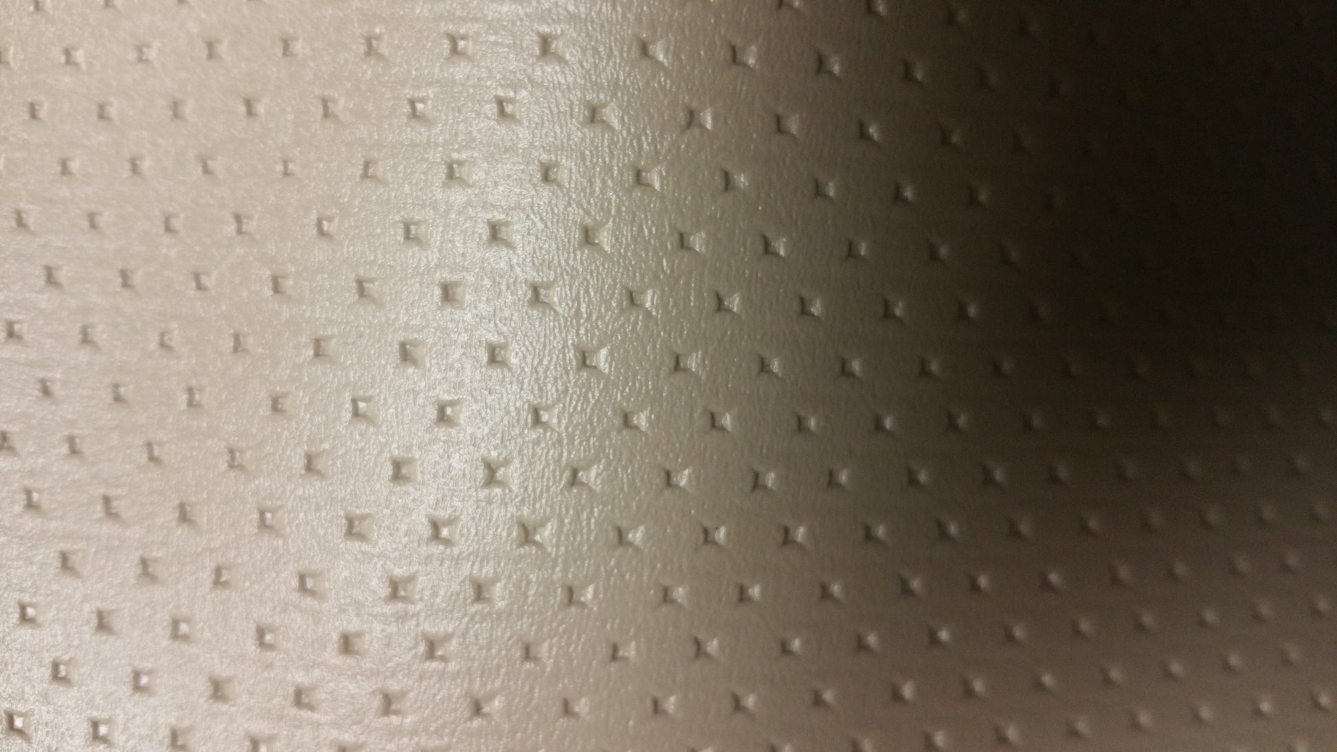 Ring 3336 R-41 Tan textured vinyl fabric sample.