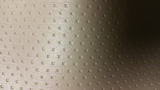 Ring 3336 R-41 Tan textured vinyl fabric sample.
