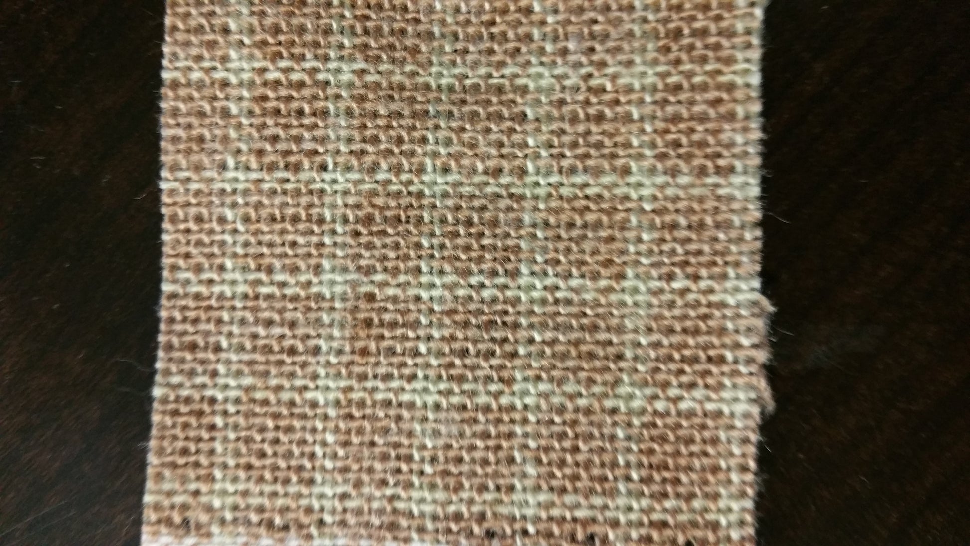Ring 45 Sand Contract Fabric swatch: Beige and brown textured weave.