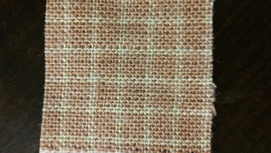 Ring 45 Sand Contract Fabric swatch: Beige and brown textured weave.