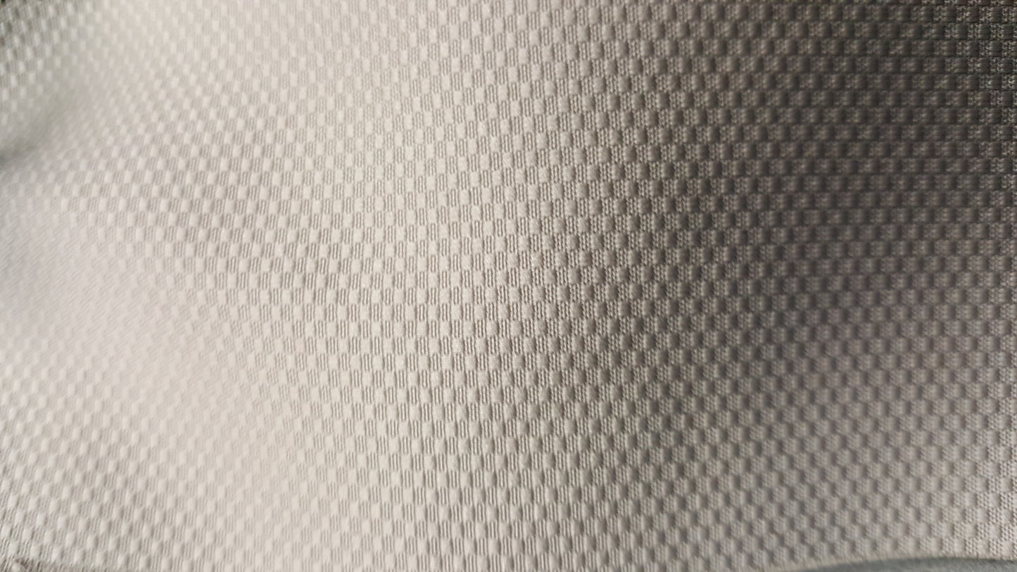 Ring 1525 RX130874 automotive fabric swatch: light beige, textured weave.