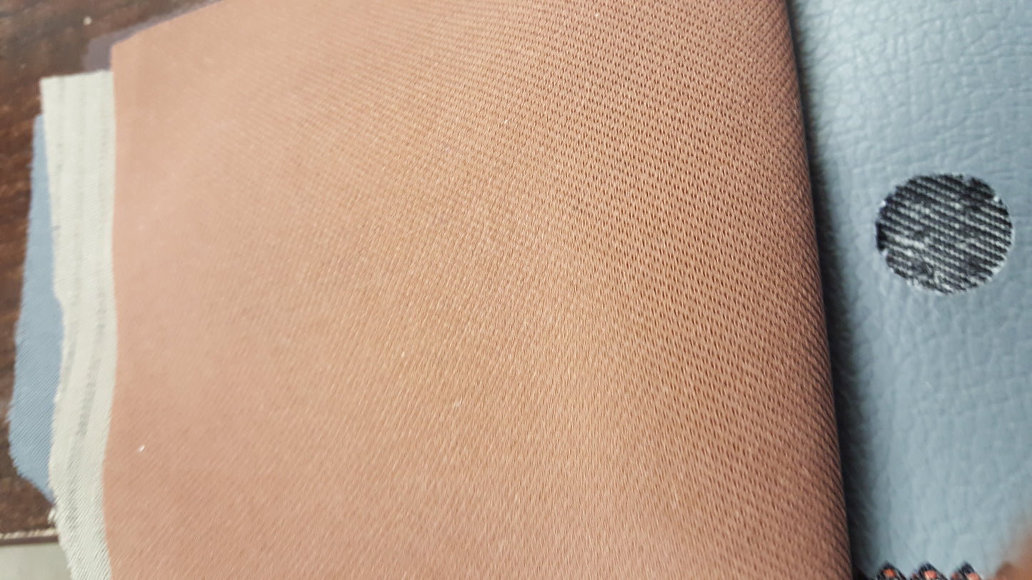 Ring 1640 Wallace Cattle Tan fabric swatch: close-up of textured, light brown material.