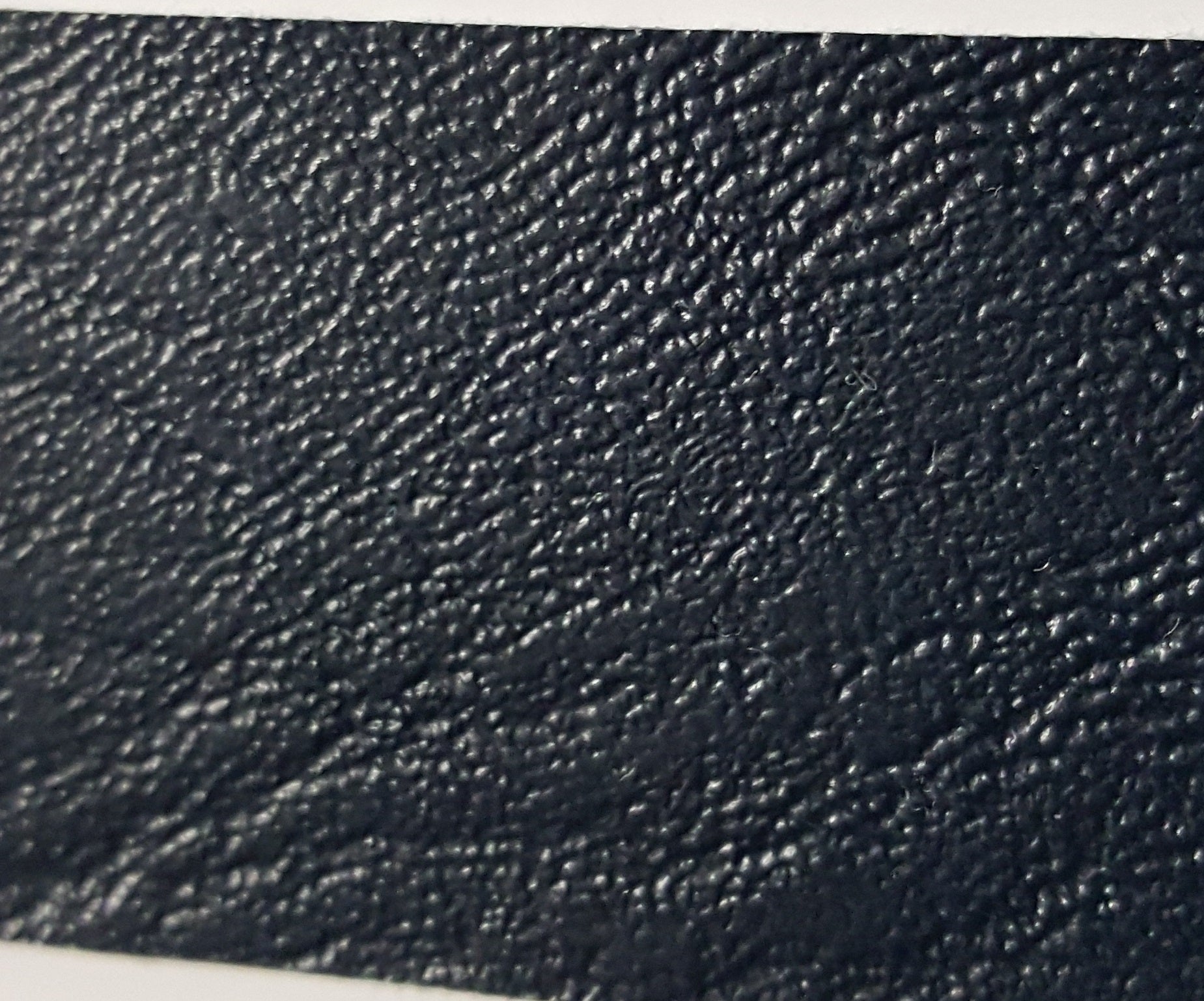 Biscayne Navy BI-108 textured vinyl sample in dark navy blue.