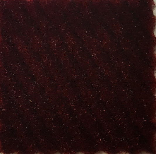 Madera Brick sample: Deep red, textured fabric swatch.