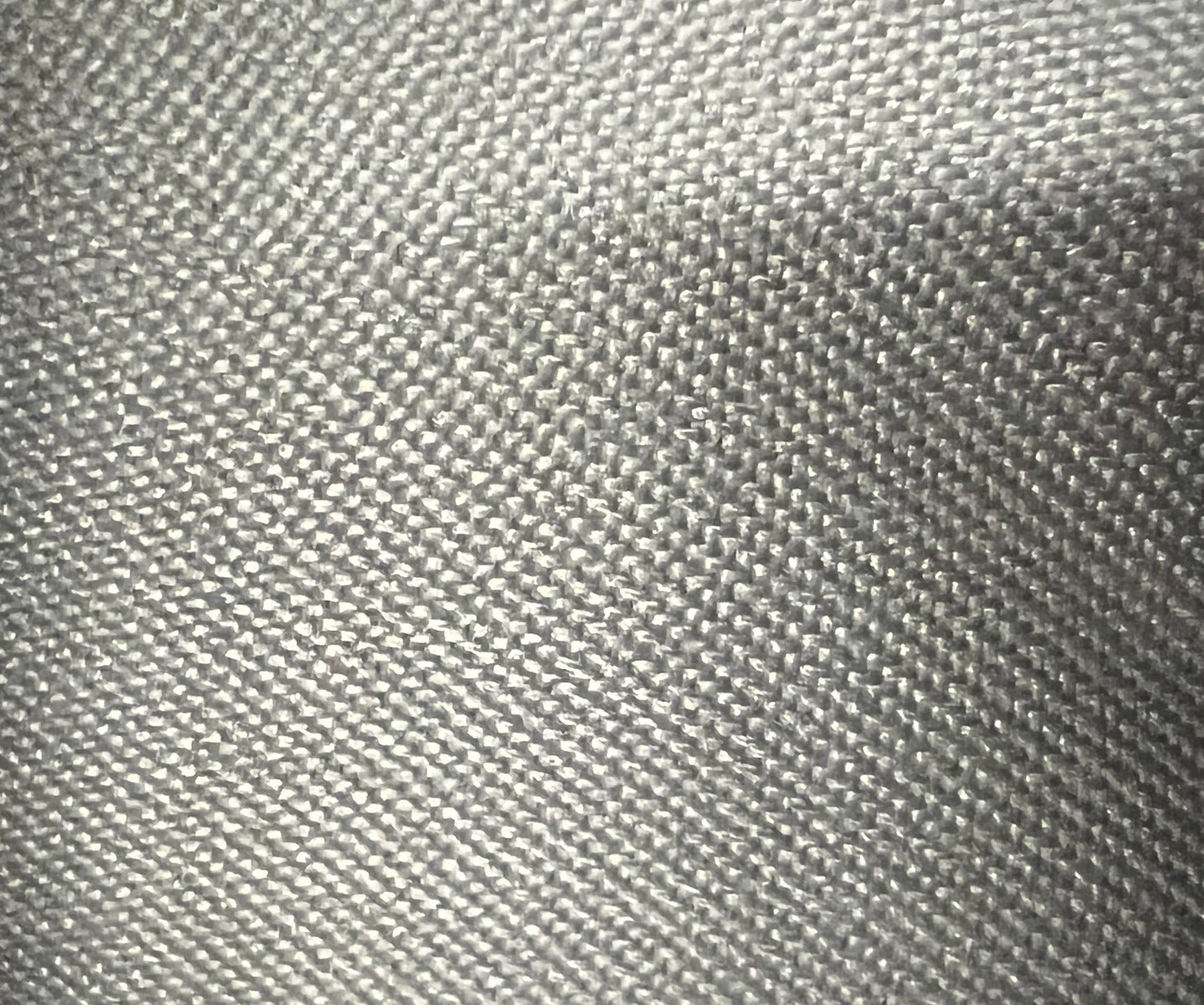 Elba M Dk Pewter 1410 fabric swatch: close-up of dark pewter textured material.