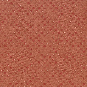 Benday Scampi fabric: red cotton with small beige dots, perfect for quilting and sewing projects.