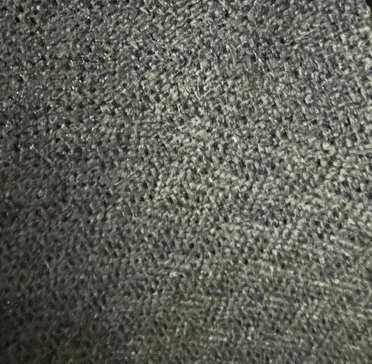 Close-up of dark gray woven wicker texture.