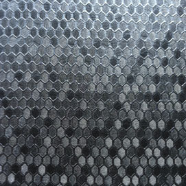Hexx Charcoal HX951: Close-up of textured, hexagonal charcoal fabric.